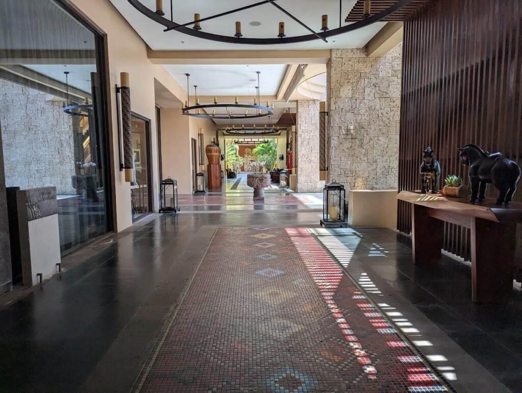 Long hallway with a wall clock at