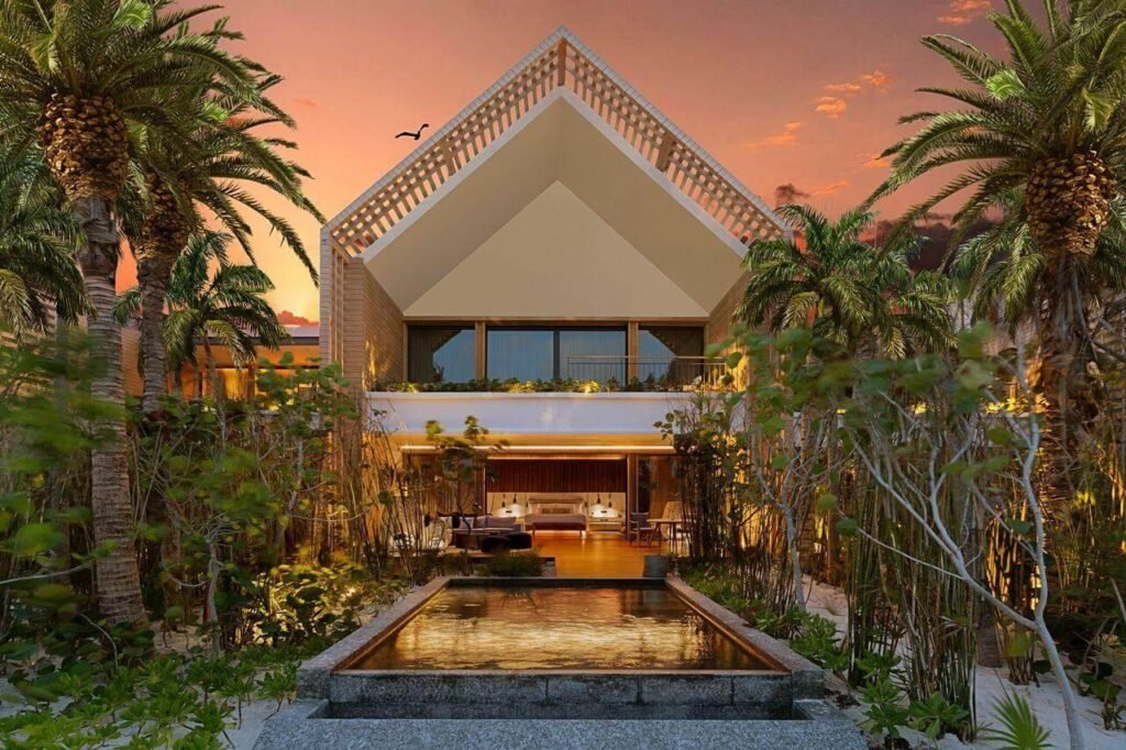 Banyan Tree Mayakoba Luxury house with pool and palm trees